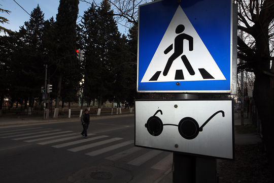 Blind cane crosswalk warning sign