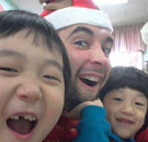 Casey with two young Korean students