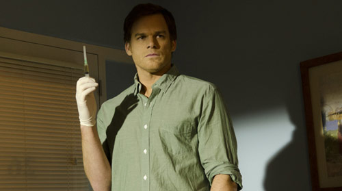 Dexter Morgan holding a syringe