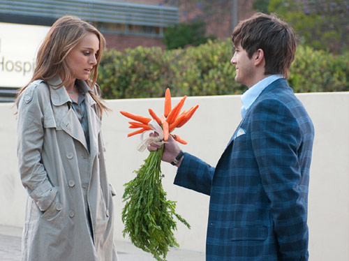 Guy gives girl carrots as flowers