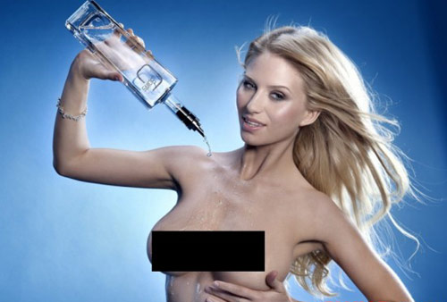 G Spirits blonde model pouring liquor on her breasts