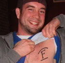 KC sports an F chest tattoo for Freeman