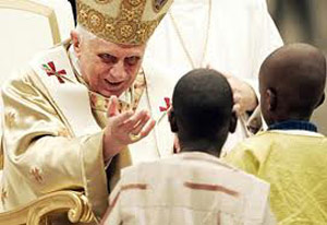 Pope blessing a child