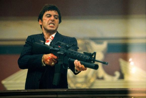 Tony Montana in Scarface with an AK-47 machine gun