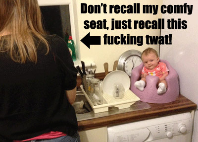 Baby on a bathroom counter with its mom