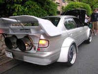 Giant muffler on a Honda Civic