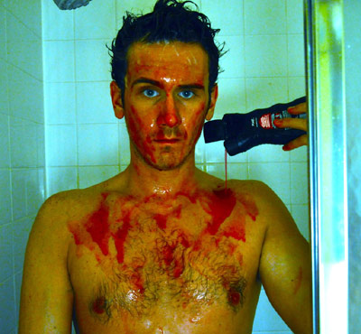 Bill Dixon covered in red Axe shampoo