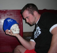 KC staring at a skull