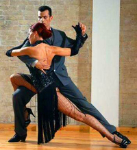 Man and woman in salsa dancing class