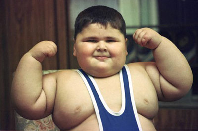 Fat boy in wrestling gear