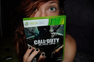 Girl holding a Call of Duty box