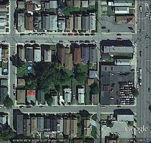 House in a neighborhood viewed from Google Earth map