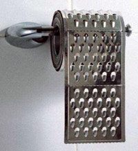 Toilet paper holder that is a cheese grater