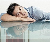 Man with his head on his arm sleeping