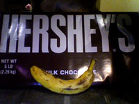 Huge Hershey bar in comparison to a banana