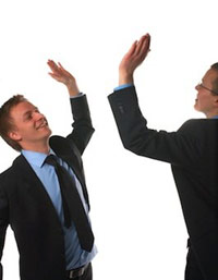 Two guys giving each other high-fives