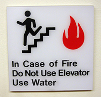 In Case of Fire, Do Not Use Elevator, Use Water