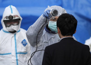 Japanese man getting checked for radiation exposure