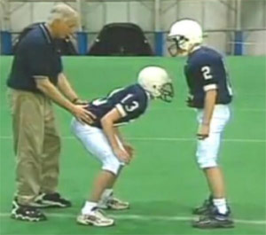 Jerry Sandusky with boys at a football camp