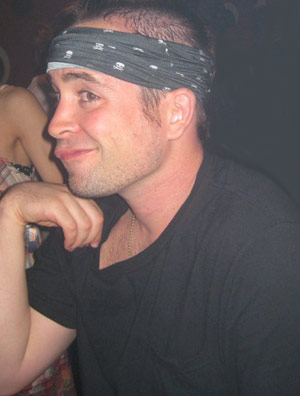 KC wearing a badass blue bandana