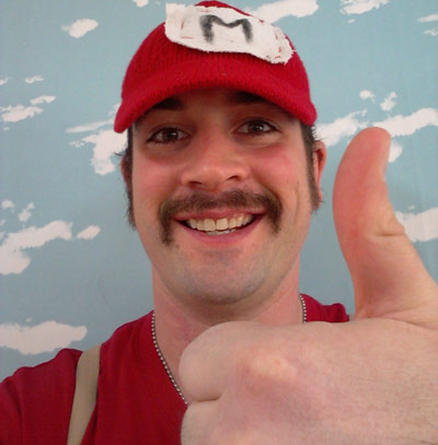 KC as Mario with a mustache