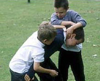 Kids beating each other up