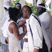 Lil Wayne and Baby kissing