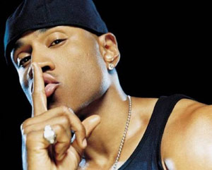 LL Cool J puts hand to mouth to say "Shh"