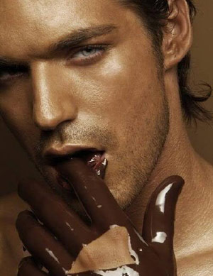 Hot guy with chocolate fingers