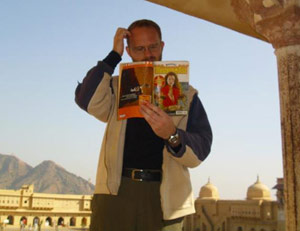 Man reading a book standing up