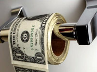 Money on on a toilet paper holder