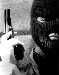 Mugger with a mask and gun