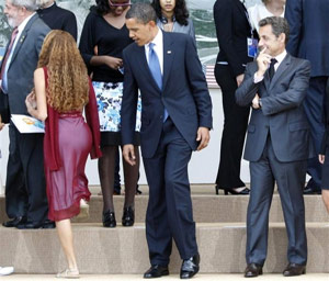 President Obama stares a girl in dress