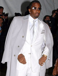 P Diddy in a suit with long jacket