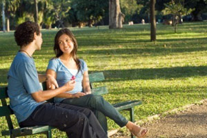 Couple in love on a park bench