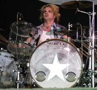 Poison band drummer