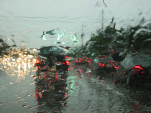 Car windshield with no visibility because of rain