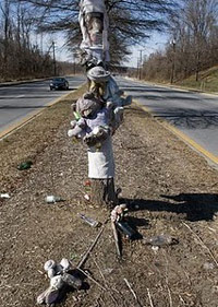 Roadside memorial cross decaying