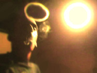 Guy blowing a pot smoke ring
