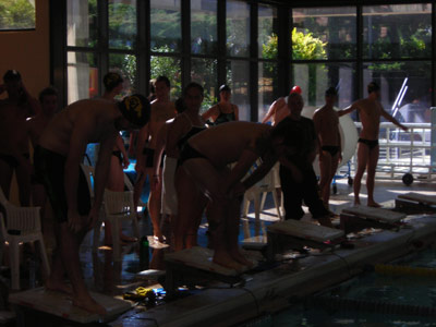 CU alumni swim team on the platform