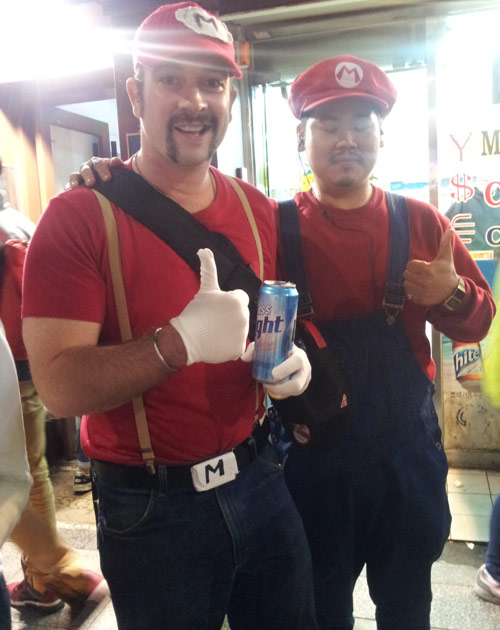 Two Super Mario costumes