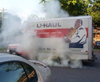 Uhaul truck with smoke coming out of it