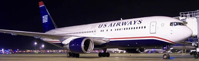 US Airways plane on the tarmac at night