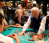Old woman playing roulette in Vegas