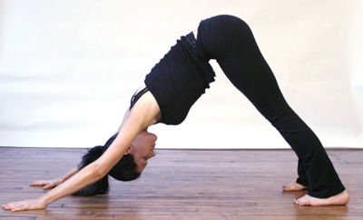 Woman in standing dog position for yoga