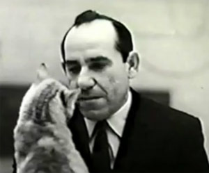 Yogi Berra staring down a cat