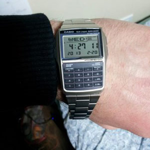 KC wearing calculator watch