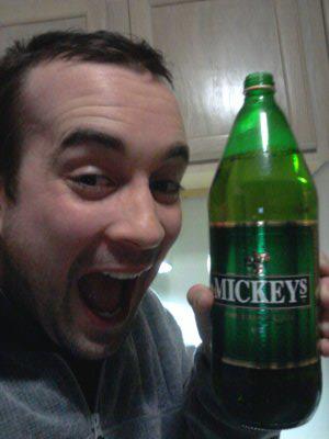 KC with Mickey's malt liquor bottle