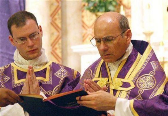 Catholic priest forgives sins at church