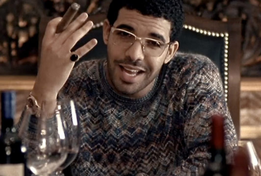 Drake wearing an Ugly Dad Sweater